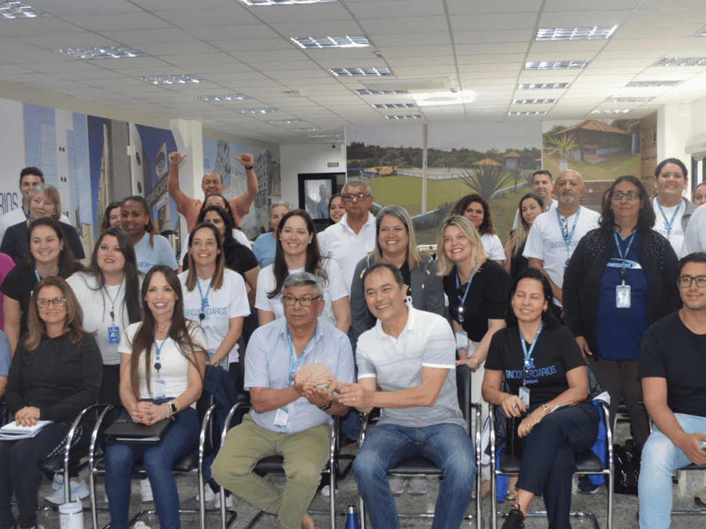 Público acompanhando palestra corporativa do Instituto MLopes